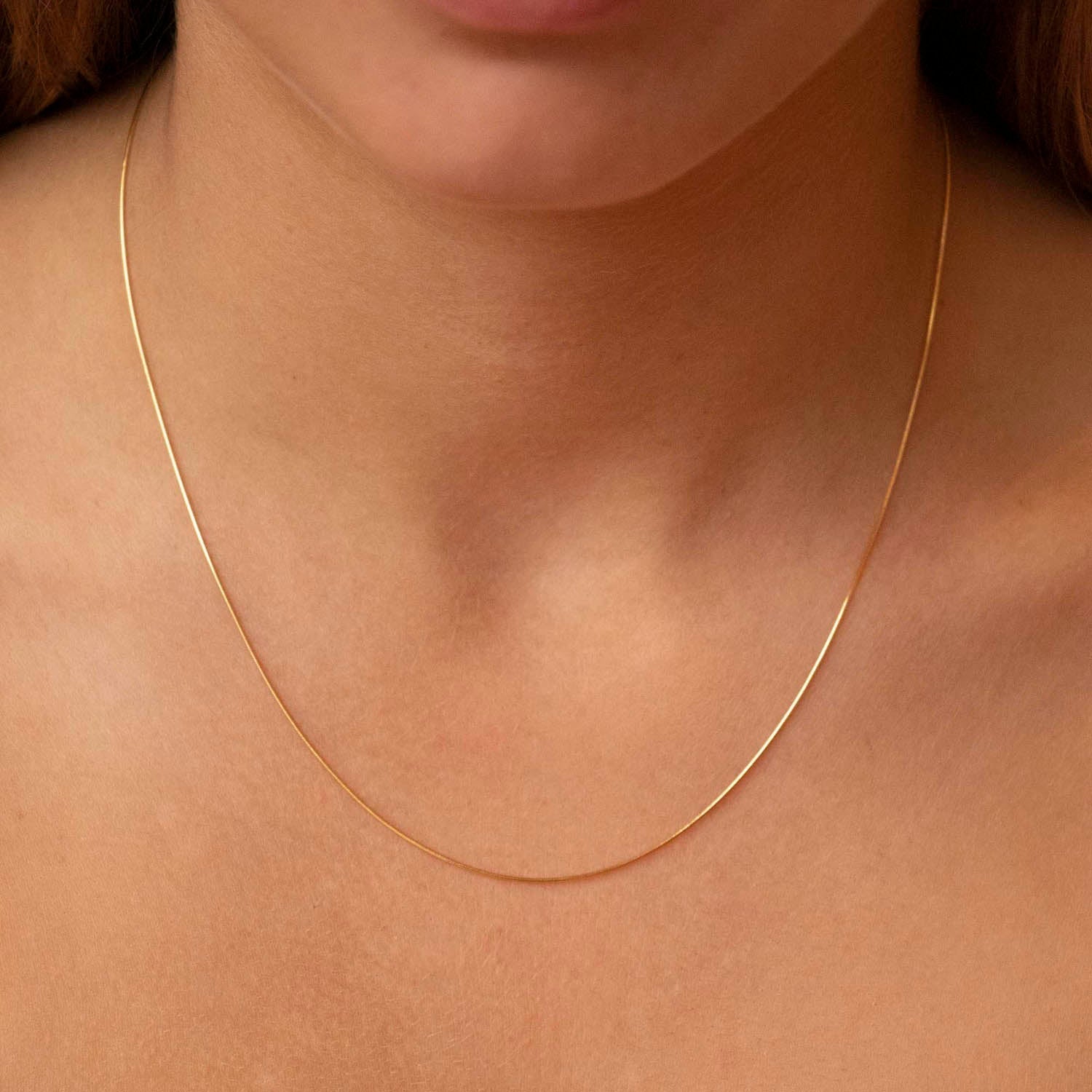9K YLW GOLD SOLID MINI SNAKE CHAIN 45cm 1.11.6574