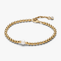 Beaded 14k gold-plated bracelet with white treated freshwater cultured pearl and clear cubic zirconia 563173C01-18 (High Resolution)