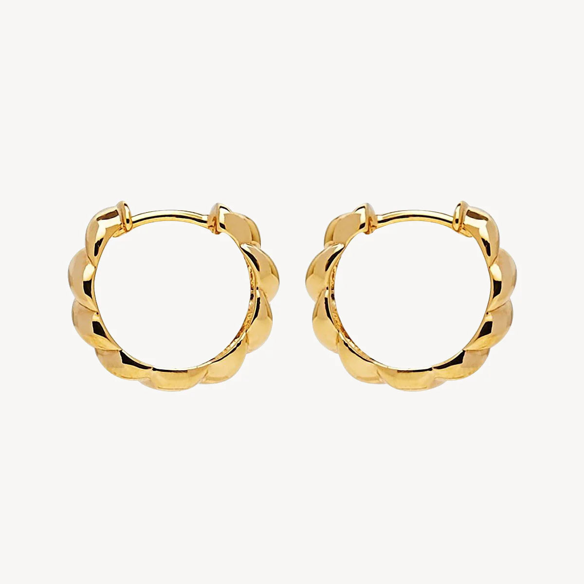 NAJO Zippy Twist Huggie Earring Colour: Yellow Gold E6519