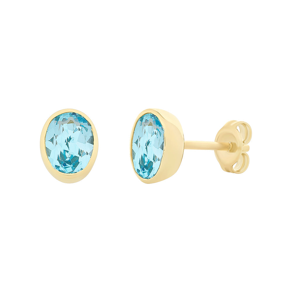 9ct Gold Blue Topaz Studs M3146